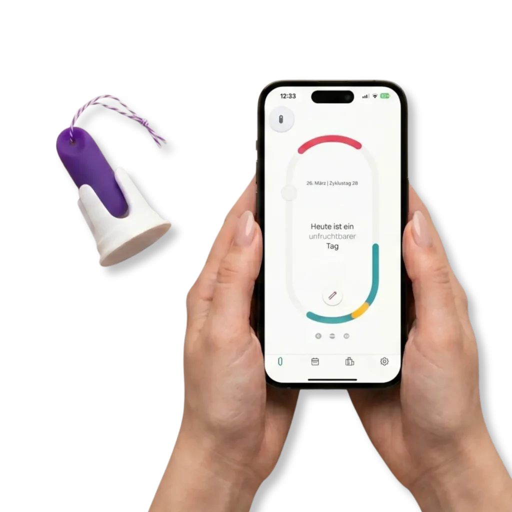 Zwei Hände halten ein Smartphone mit der trackle-App, die den Zyklusstatus „Heute ist ein unfruchtbarer Tag“ anzeigt. Links daneben ist der lila trackle-Temperatursensor in seiner weißen Halterung vor einem helllilafarbenen Hintergrund zu sehen.